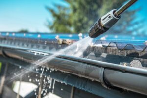 Roof repair cleaning debris