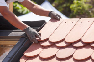 roofing shingles terracotta color roofing company worker installation